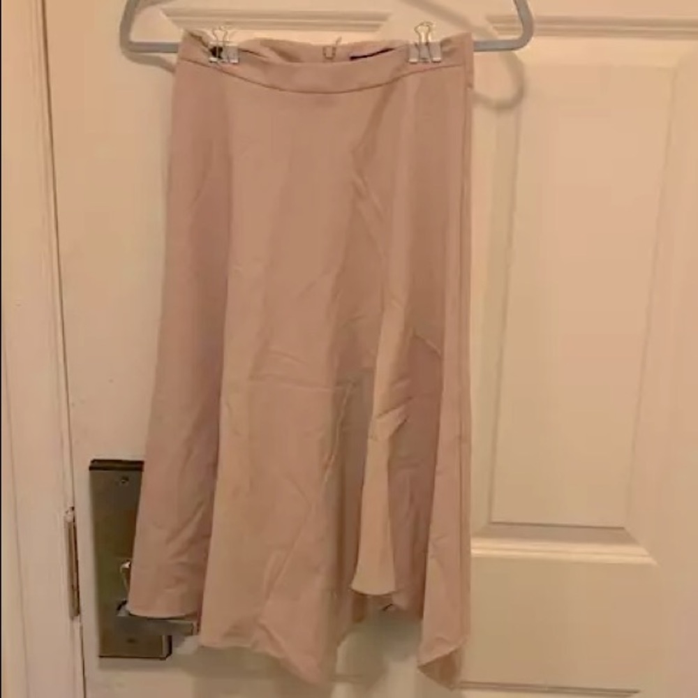 Peach shaded asymmetrical hem-lined skirt